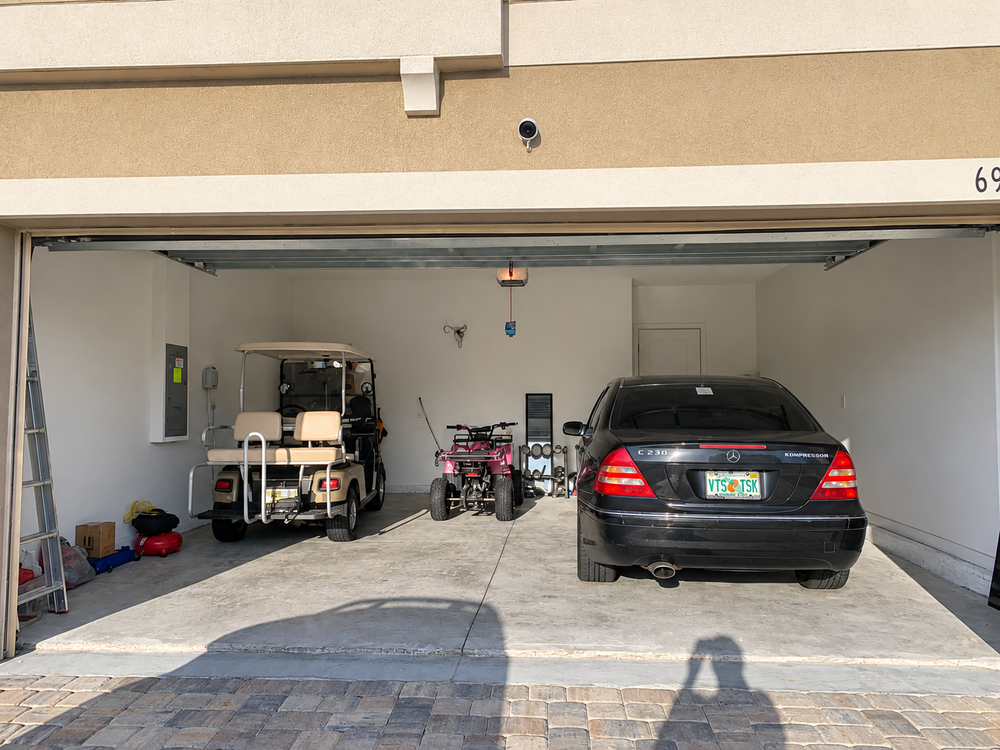 Garage before the champagne metallic epoxy transformation